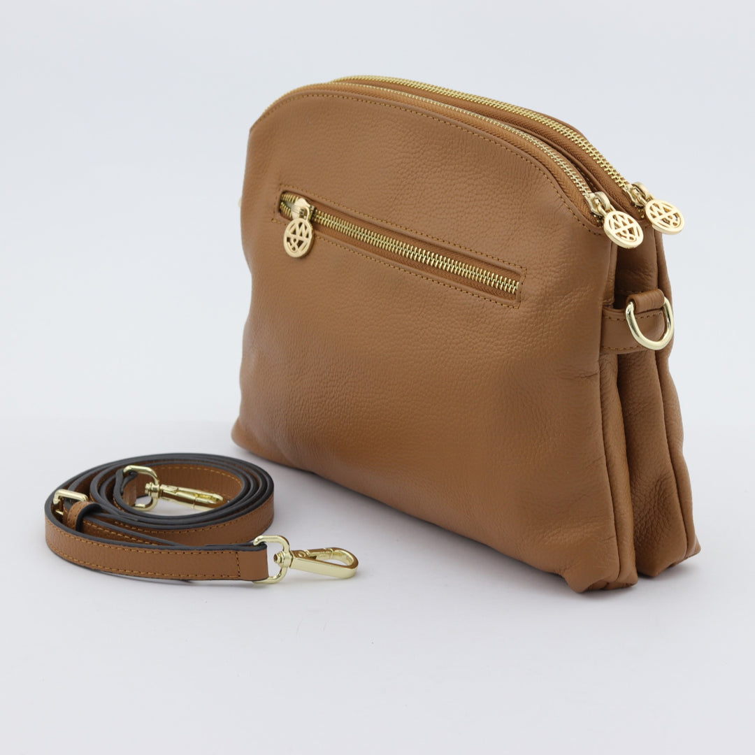 back of caramel Abigail bag showing zip and spare strap #colour_caramel