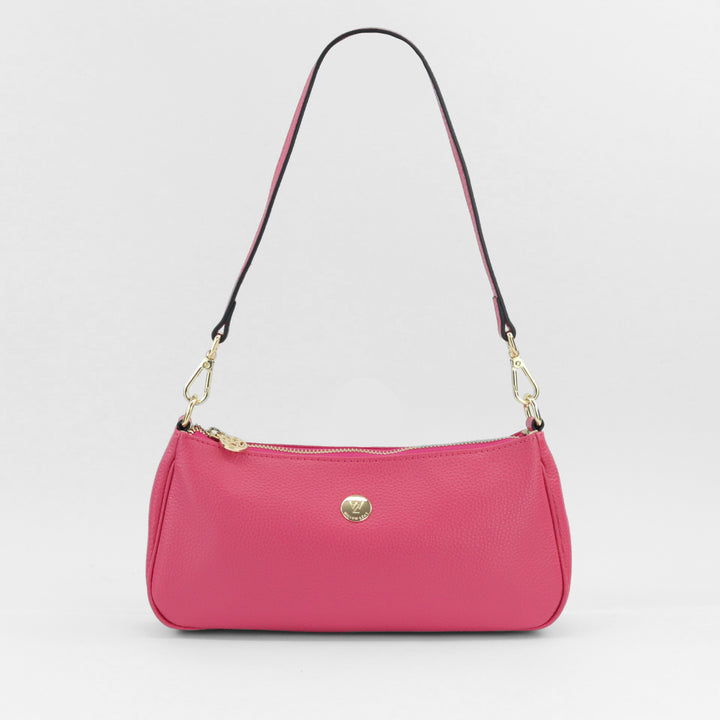 bronte baguette bag in hot pink leather with gold zip and logo and short removable strap#colour_hot-pink