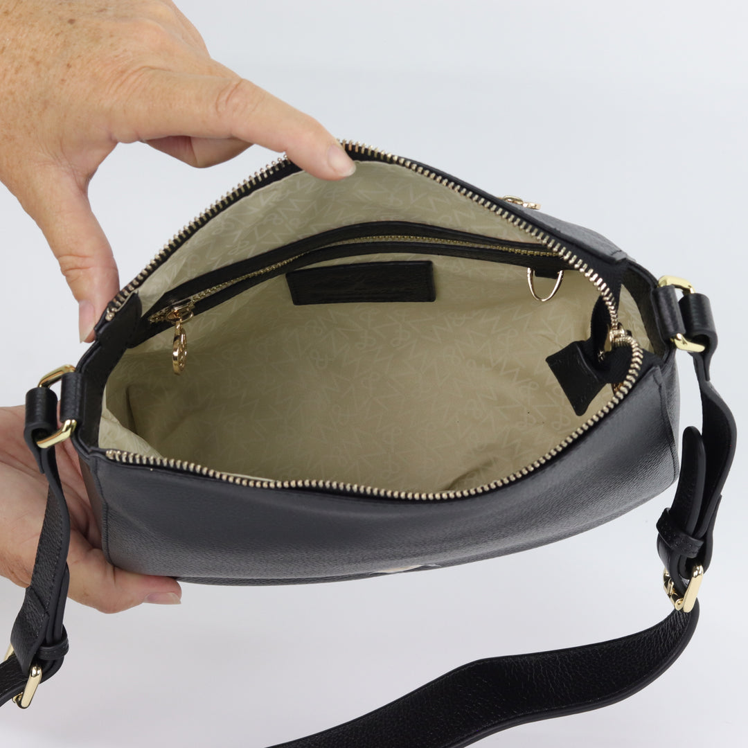 inside view oh ingrid structured leather handbag with internal pockets and gold hardware#colour_black