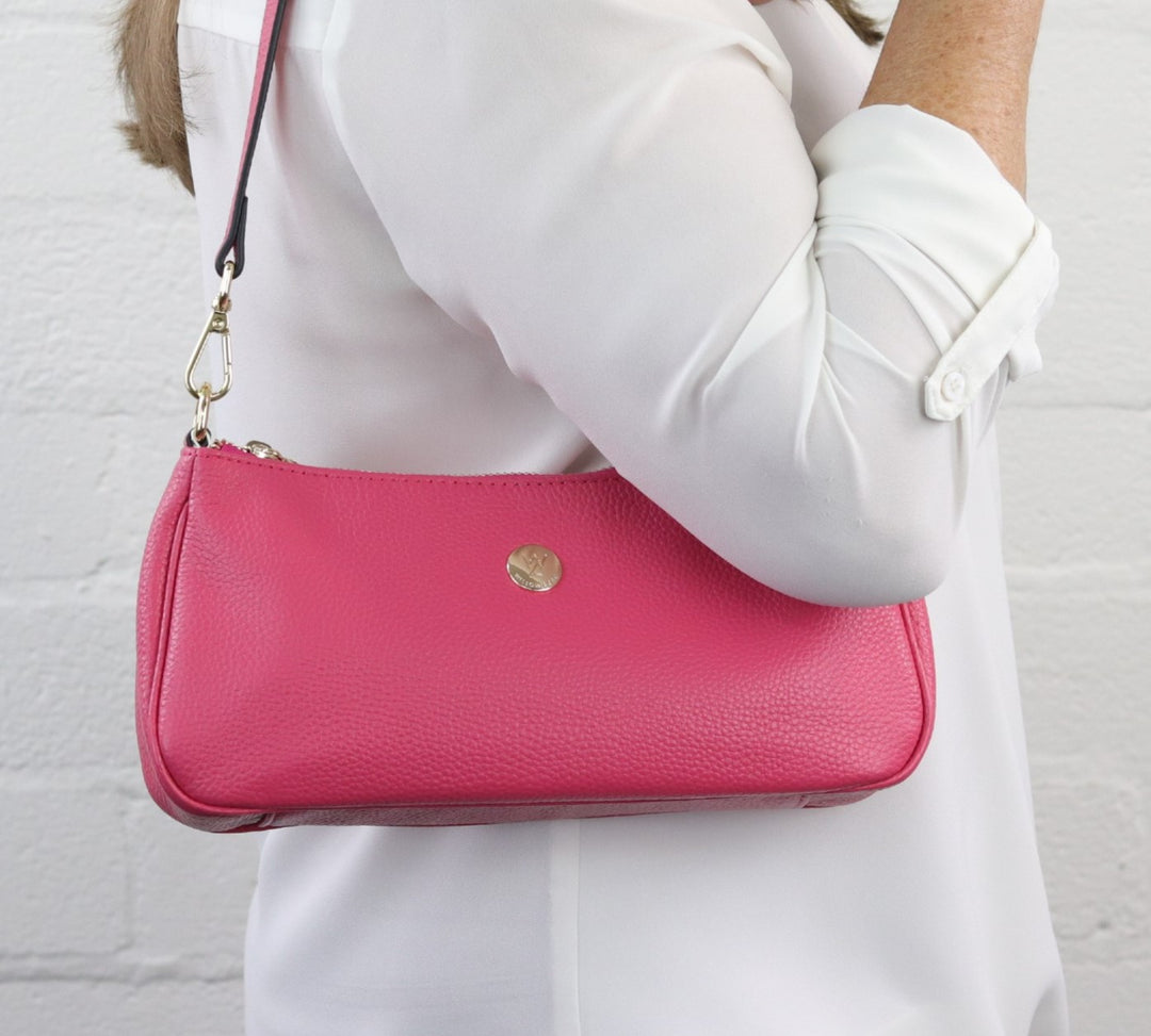 model wearing pink Bronte shoulder bag 