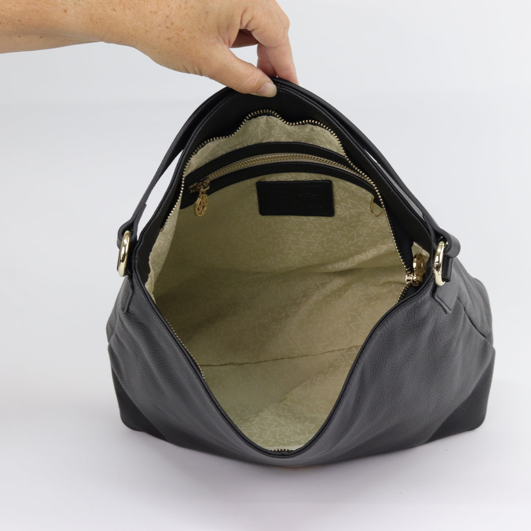 inside view of amber hobo with custom lining and interior pockets#colour_fog