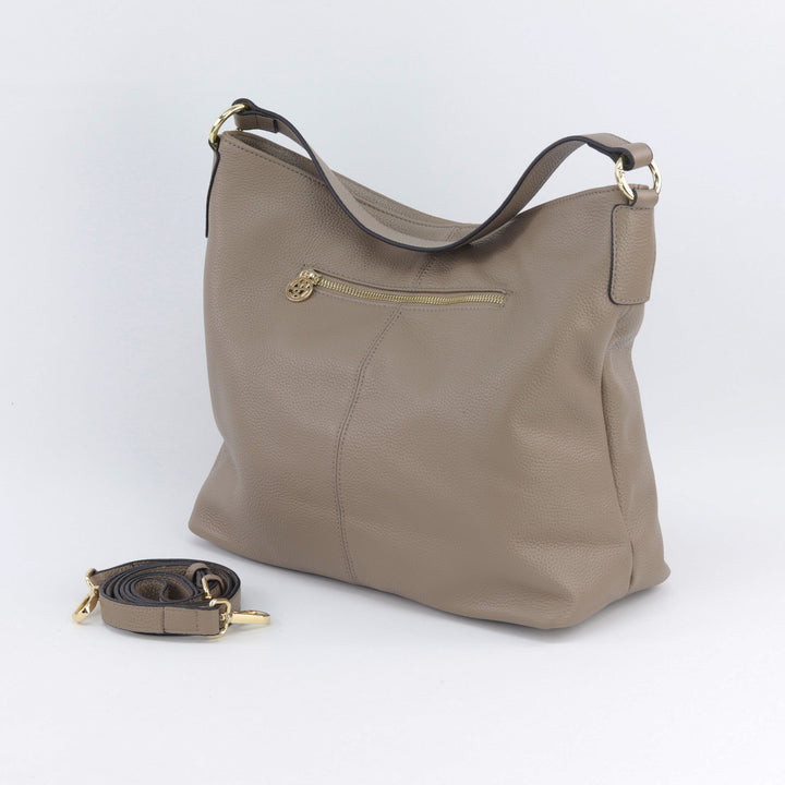 back view of amber hobo in light brown with included leather crossbody strap#colour_fog