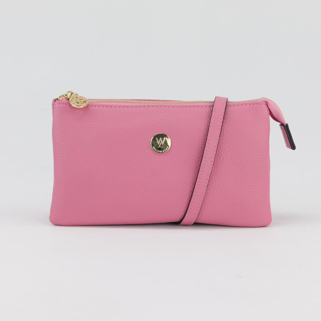 mid pink pebbled leather clutch handbag with both shoulder and wrist strap and gold hardware#colour_princess-pink