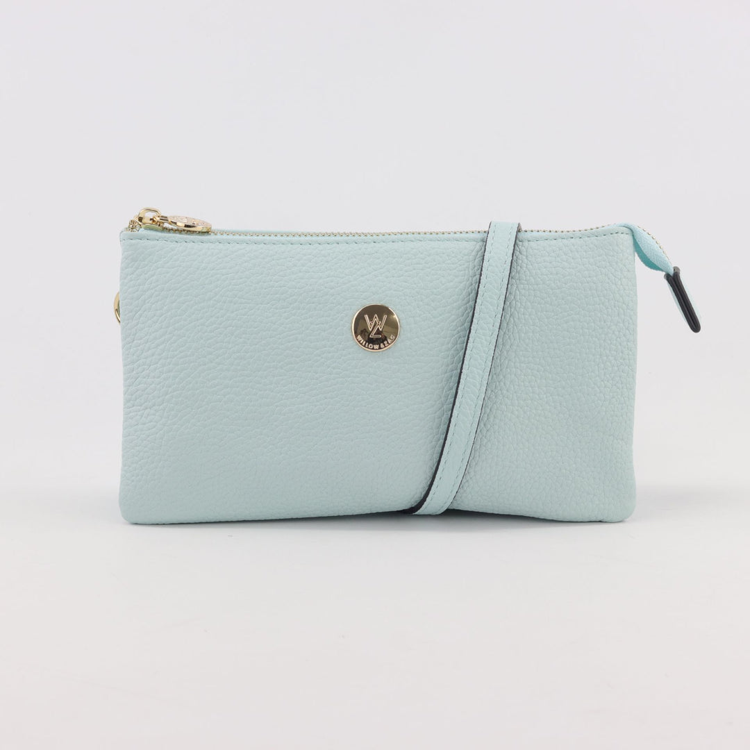 australian designed leather clutch or crossbody handbag in light blue skylight coloured pebbled leather#colour_skylight
