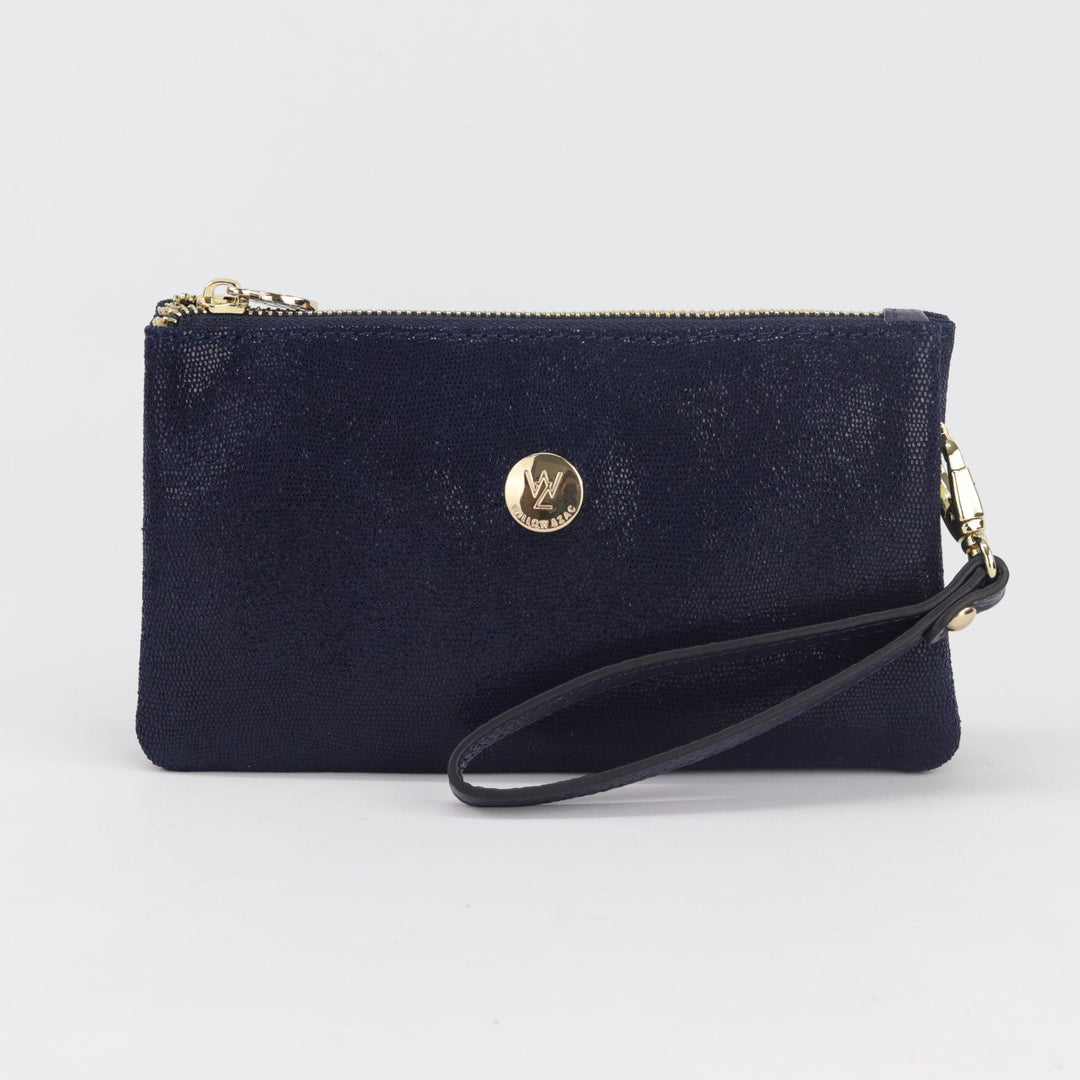 polly wallet purse in navy cosmos printed suede pattern with leather wrist strap and gold hardware #colour_navy-cosmos