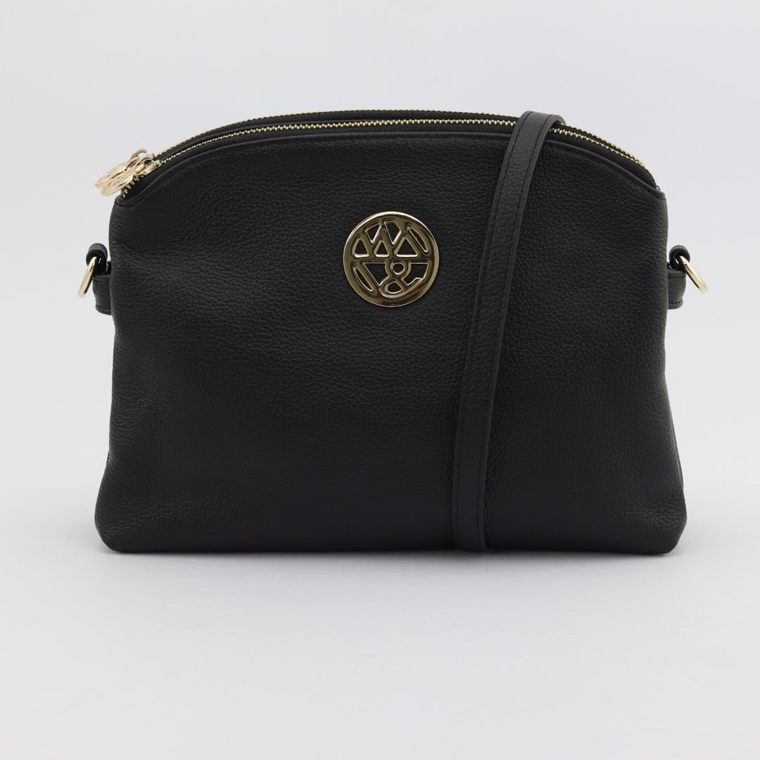 Black leather handbag with curved top and quality gold zips and logo#colour_black