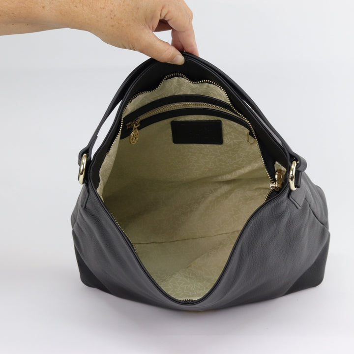 inside view of black leather hobo with custom lining and interior pockets#colour_black