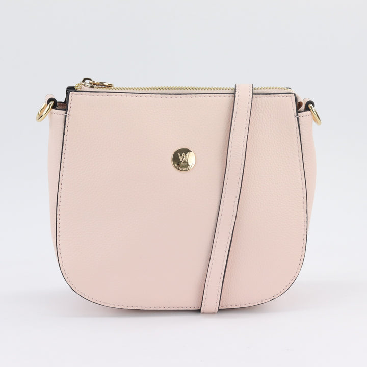 front view of clara structure leather hand bag in pale pastel pink#colour_pink-whisper
