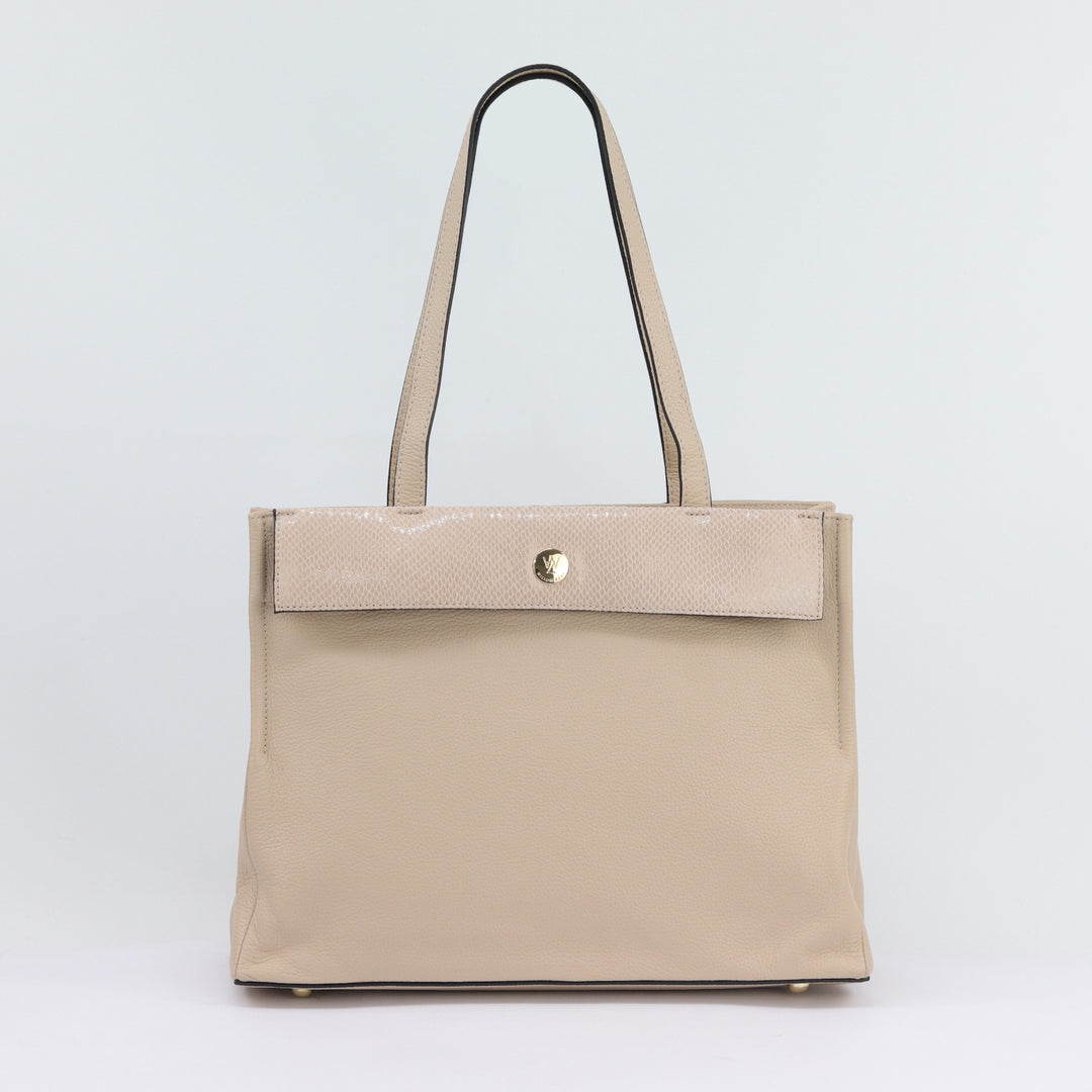 eleanor tote in nude pebbled leather with gold button logo on white background#colour_nude-with-seashell