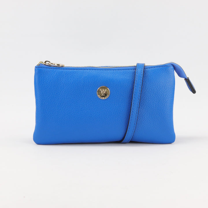 Bright blue cobalt coloured leather clutch wallet with gold button logo and zip#colour_cobalt