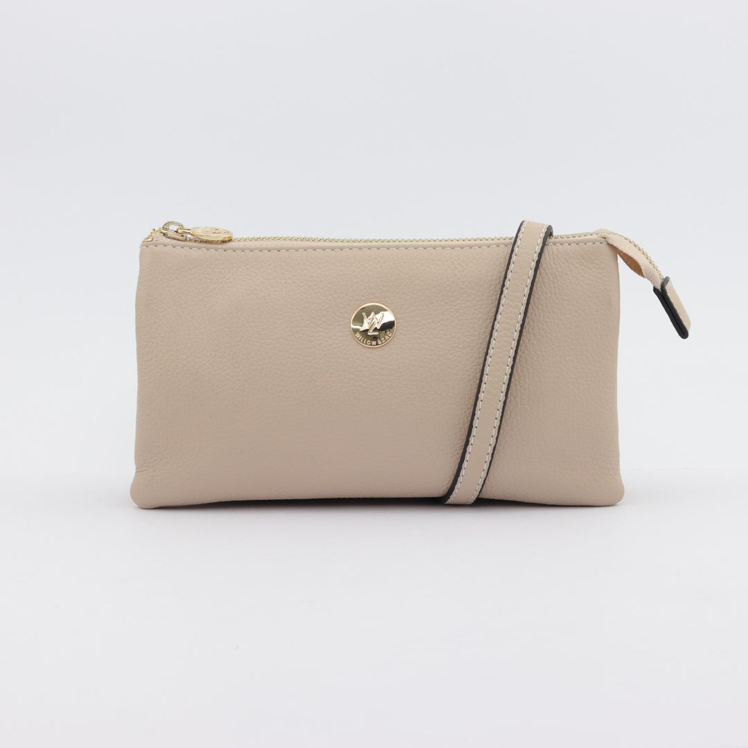 evie wallet clutch neutral nude coloured leather with optional long leather strap#colour_nude