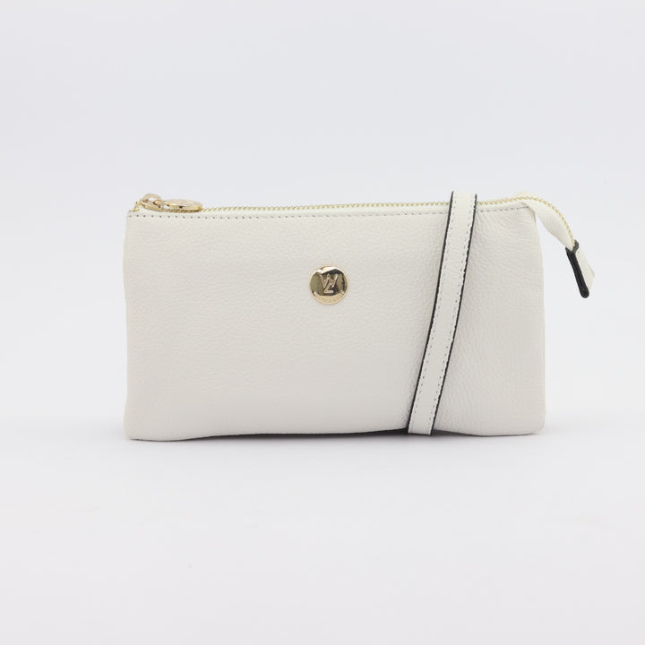 evie clutch or wallet in bright white pebbled leather with optional long strap and gold zip#colour_white