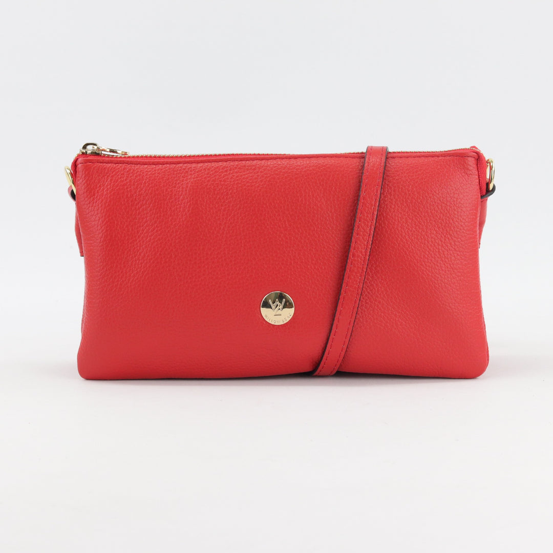 bright red leather handbag clutch with adjustable long leather strap and gold details#colour_salsa-red