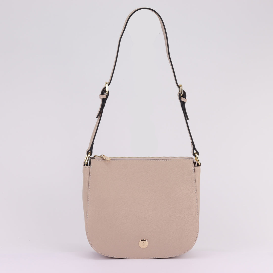 neutral nude structured leather bag with wide shoulder strap and gold hardware#colour_nude