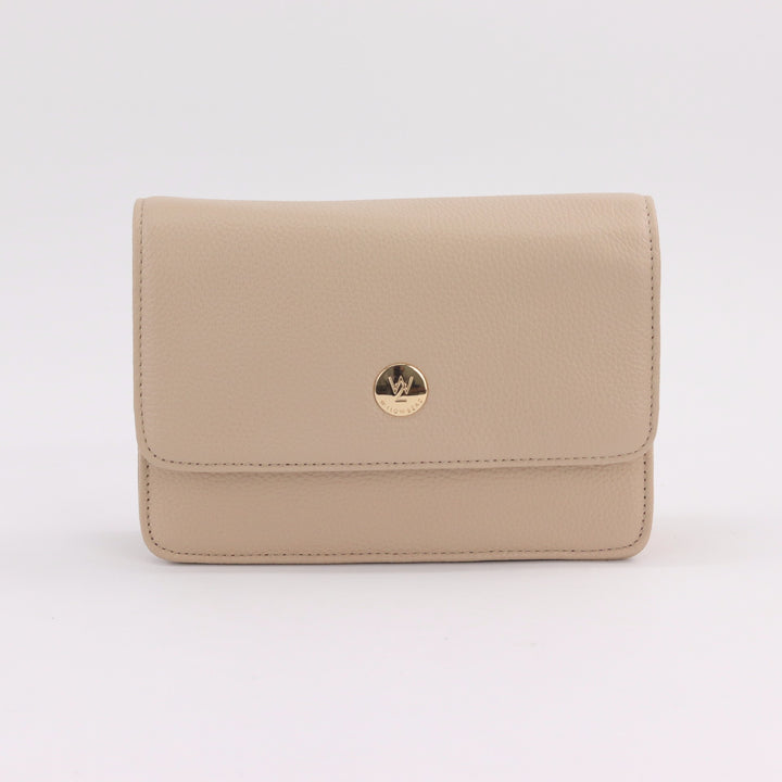 compact messenger style clutch or crossbody bag in neutral nude coloured pebbled leather with gold button logo#colour_nude