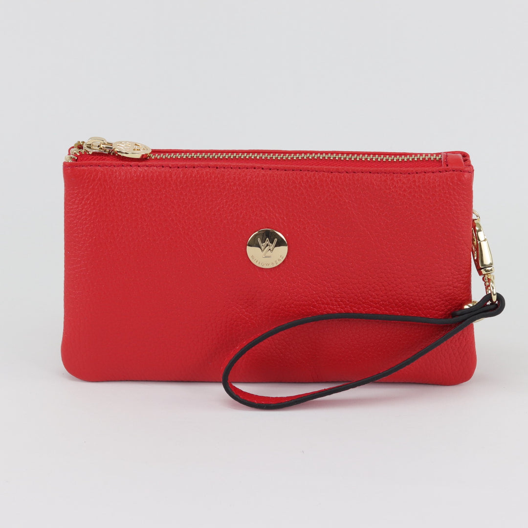 bright red coloured leather wallet purse wiht gold zip and button logo and leather wrist strap#colour_salsa-red