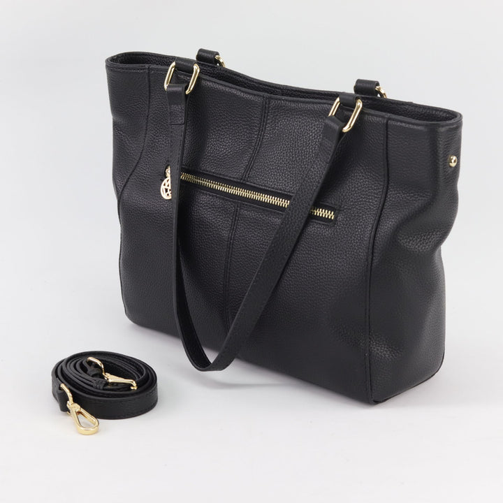 back view of reanna tote handbag showing rear zip and included long leather strap#colour_black-leather