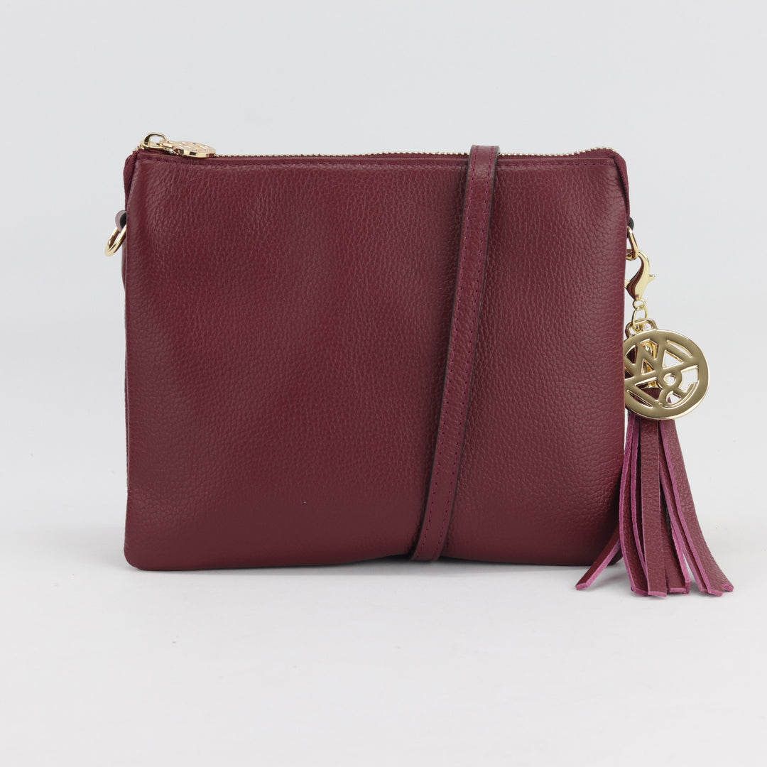 shiraz square shaped leather clutch handbag with removable tassel made with quality gold hardware#colour_shiraz
